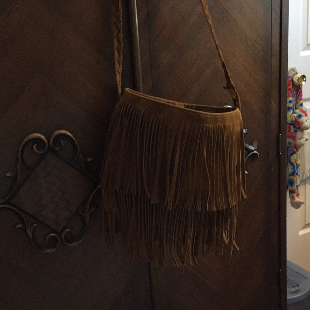 Fringe faux suede bag purchased at East Meets West